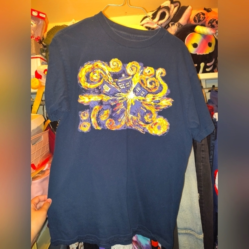 Blue Graphic T-Shirt with Yellow and Orange Design Doctor Who TV Show Piper Wolf